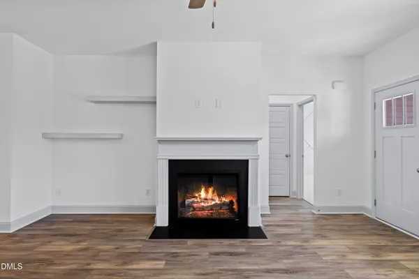 a living room with a fireplace