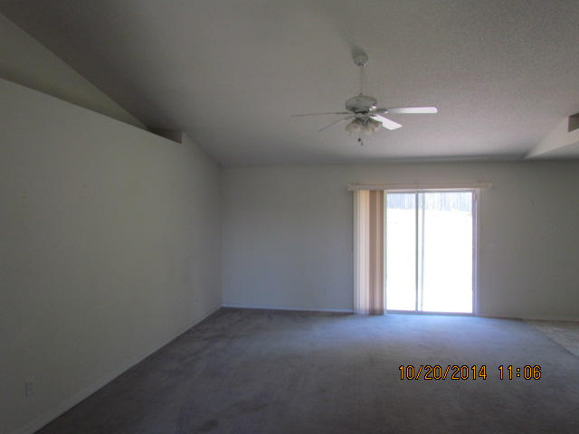 1226 Northview Drive Crestview, FL 32536 - Photo 2 of 13 an empty room with a window and a fan