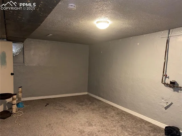 a view of room with racks on the wall