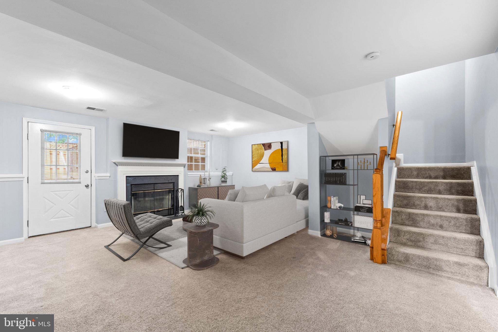 6008 Bingley Road Alexandria, VA 22315 - Photo 22 of 39 Lower level rec rm w/wood burning FP