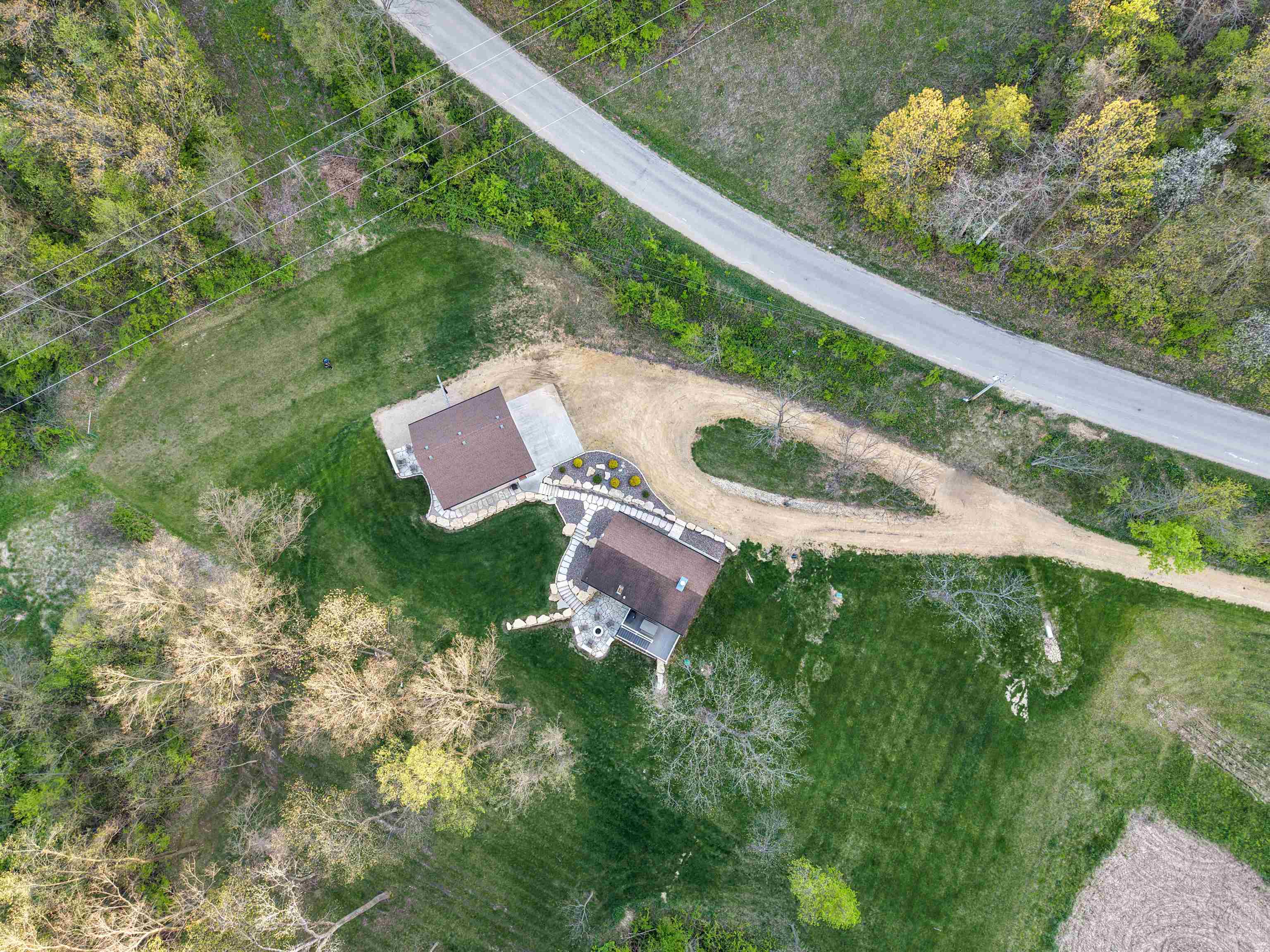 5829 South Pleasant Hill Road Elizabeth, IL 61028 - Photo 37 of 68 an aerial view of a house with a yard