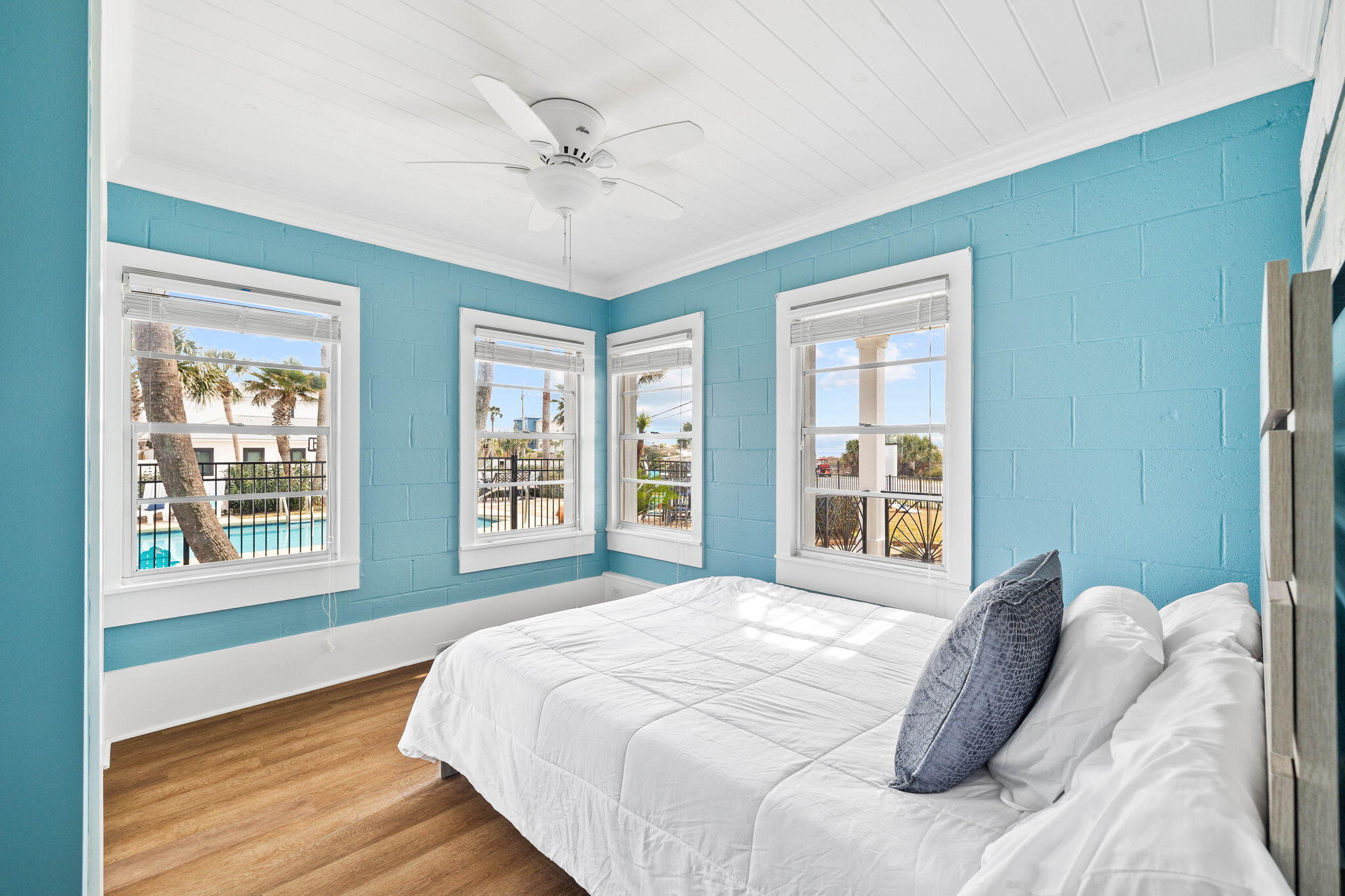 20816 Front Beach Road Panama City Beach, FL 32413 - Photo 24 of 68 a large bed sitting in a bedroom next to a window
