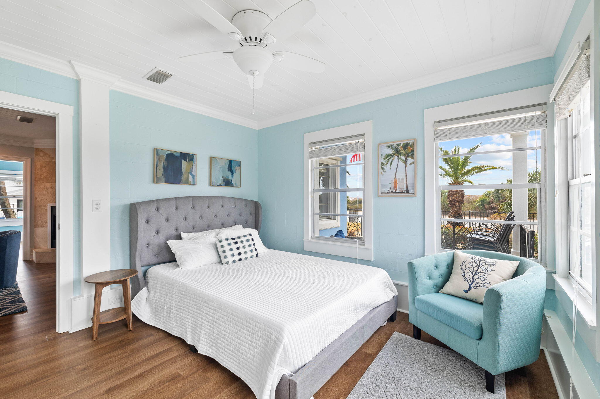 20816 Front Beach Road Panama City Beach, FL 32413 - Photo 30 of 68 a bedroom with a large bed and a couch