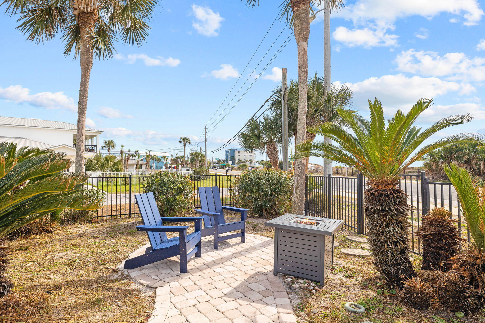 20816 Front Beach Road Panama City Beach, FL 32413 - Photo 59 of 68 a view of a patio with a table and chairs