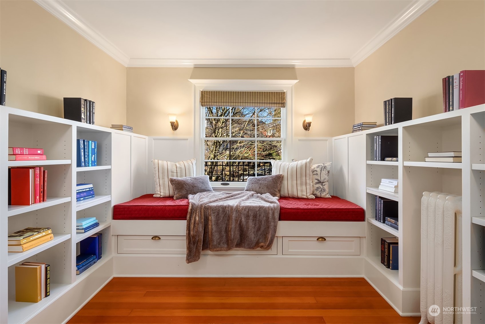 3708 42nd Avenue South Seattle, WA 98144 - Photo 20 of 40 a bedroom with a bed and a book shelf