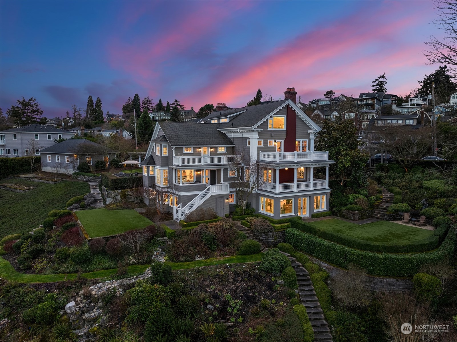 3708 42nd Avenue South Seattle, WA 98144 - Photo 2 of 40 a front view of a house with a yard and lake view