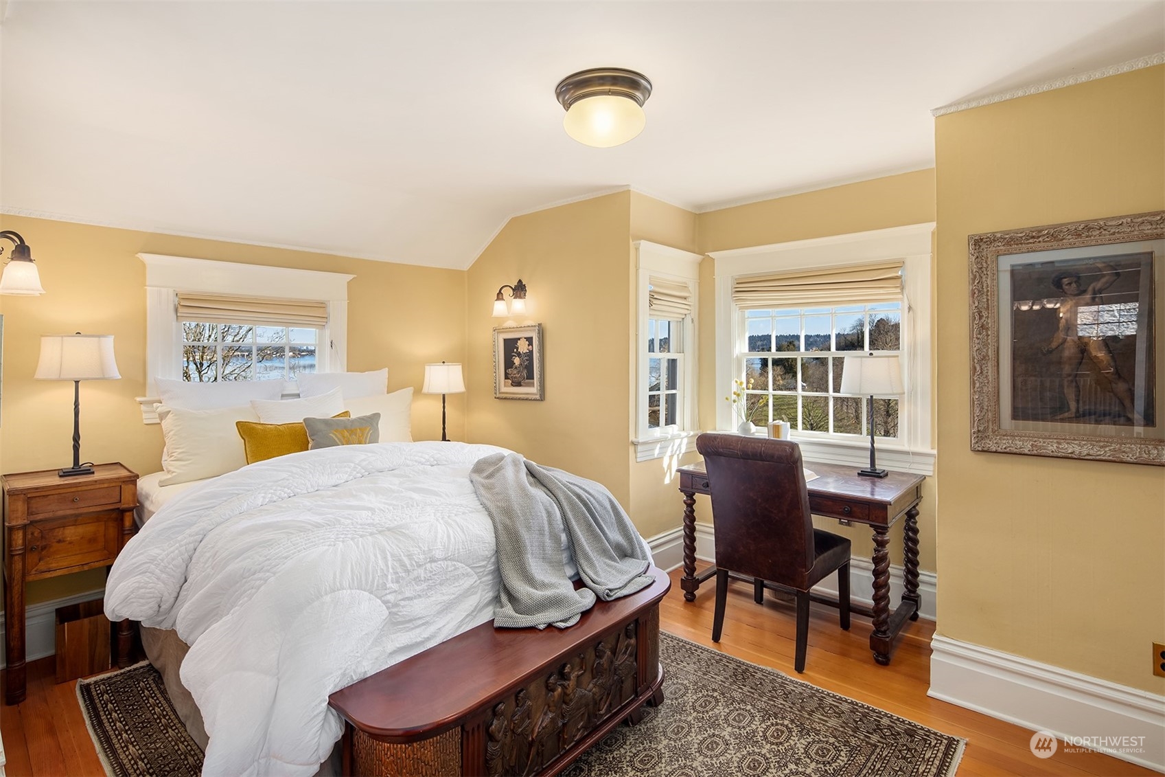 3708 42nd Avenue South Seattle, WA 98144 - Photo 23 of 40 a bedroom with a bed and wooden floor