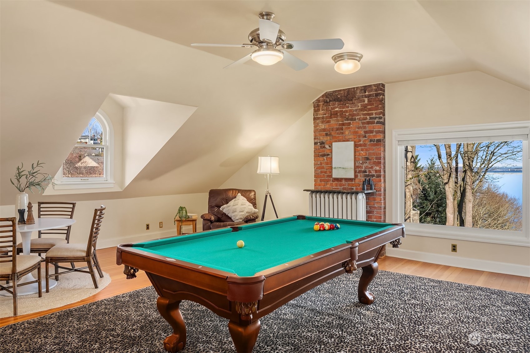 3708 42nd Avenue South Seattle, WA 98144 - Photo 29 of 40 a room with pool tables and windows