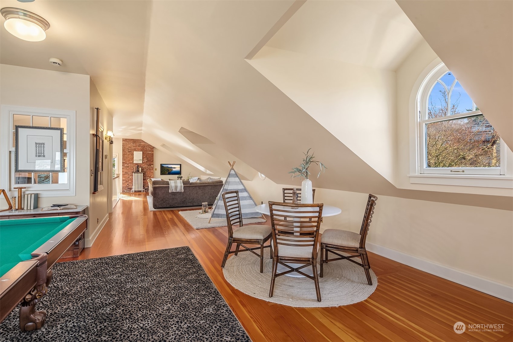 3708 42nd Avenue South Seattle, WA 98144 - Photo 31 of 40 a living room with furniture and a wooden floor