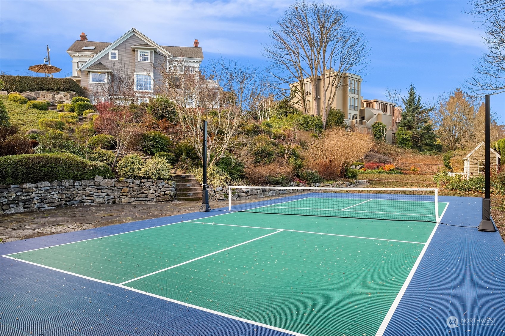 3708 42nd Avenue South Seattle, WA 98144 - Photo 35 of 40 a view of a big room with a big yard and potted plants