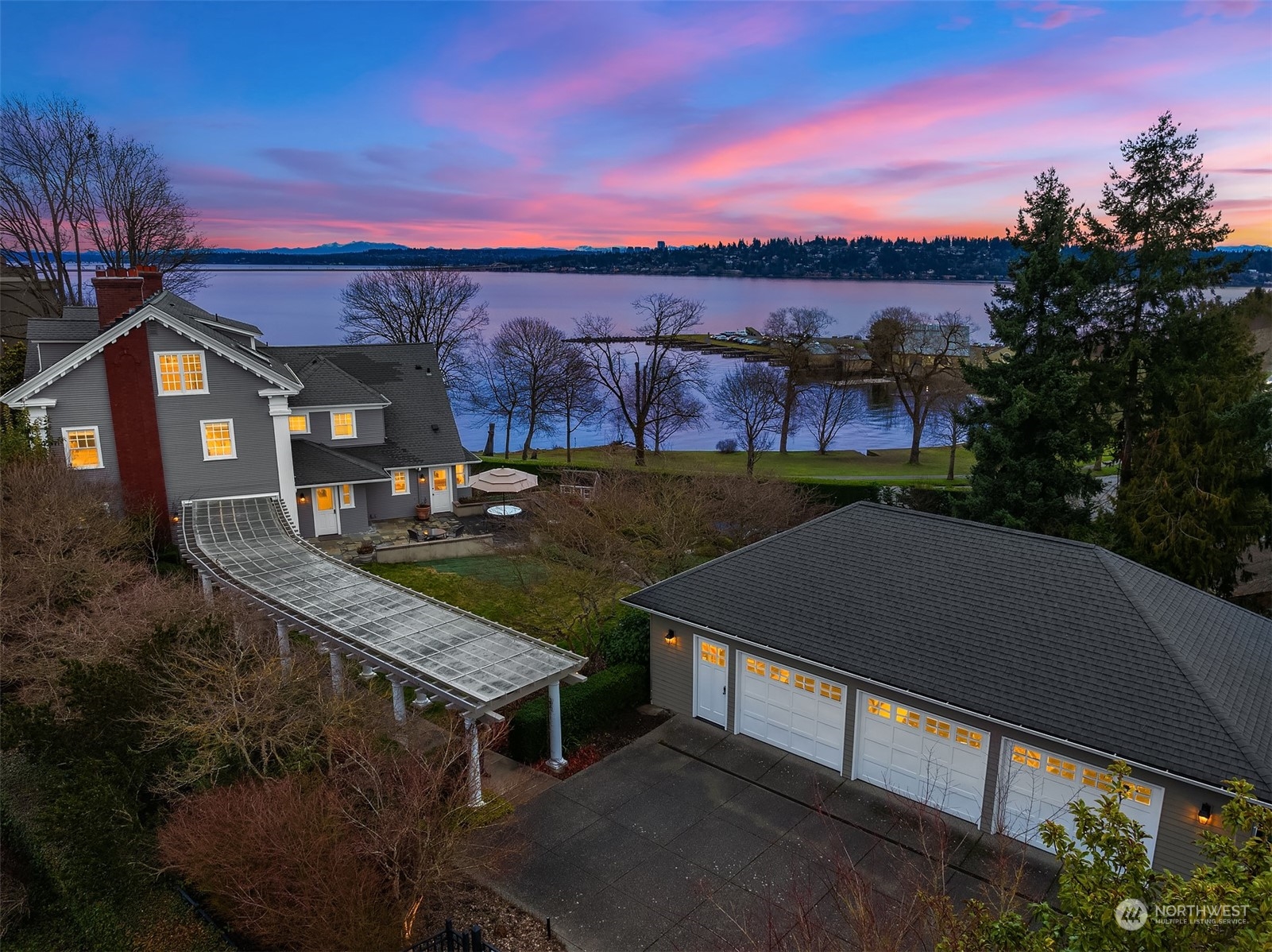 3708 42nd Avenue South Seattle, WA 98144 - Photo 4 of 40 a view of a terrace with a table and chairs under an umbrella