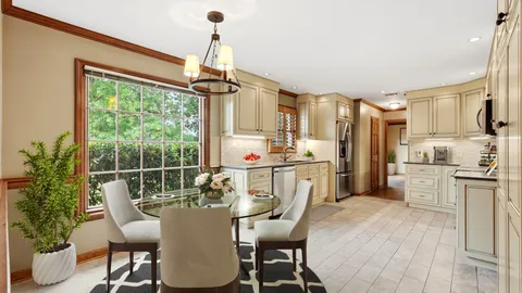 a kitchen with stainless steel appliances granite countertop a refrigerator sink and cabinets