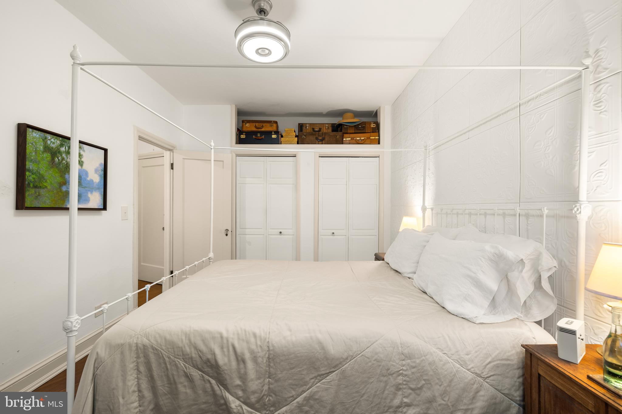 2032 Belmont Road Northwest, Unit 302 Washington, DC 20009 - Photo 24 of 31 Bedroom with Retractable Ceiling Fan