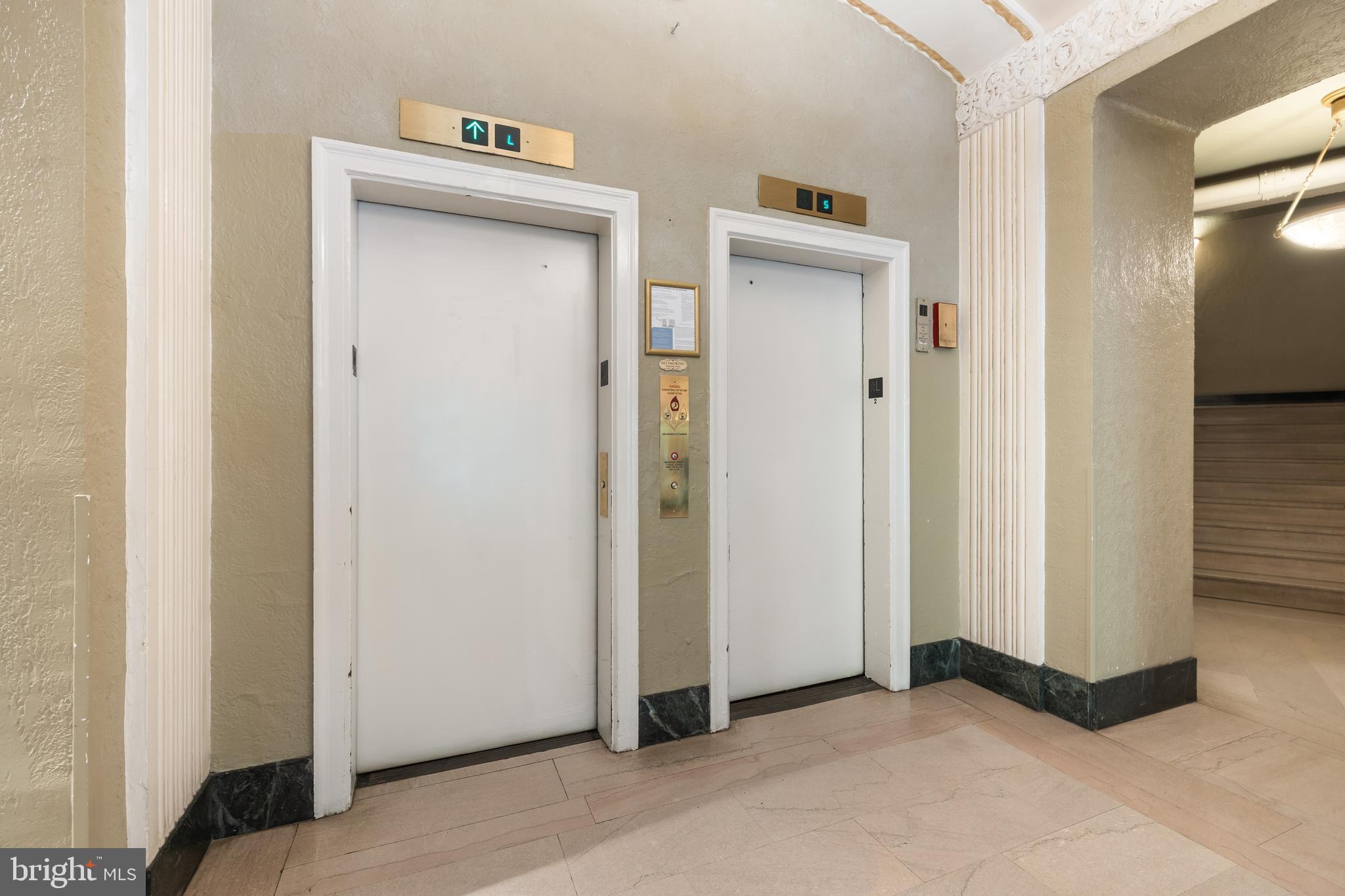 2032 Belmont Road Northwest, Unit 302 Washington, DC 20009 - Photo 5 of 31 Elevators Across from 305