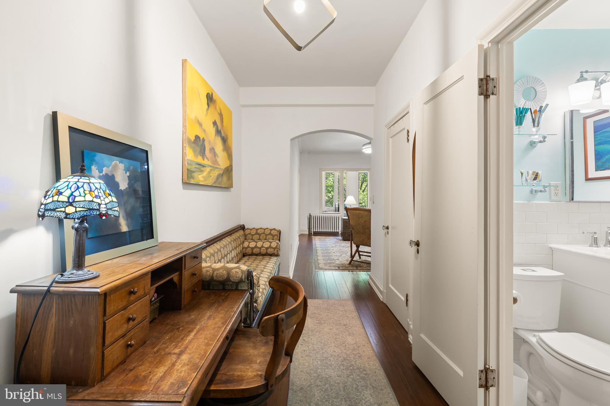 2032 Belmont Road Northwest, Unit 302 Washington, DC 20009 - Photo 6 of 31 Inviting Entry Foyer with Arched Doorway