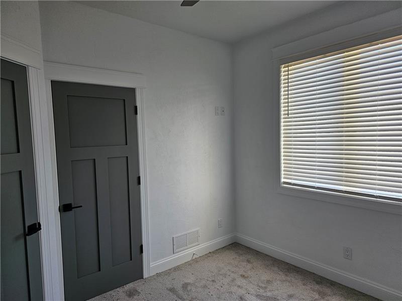 801 Wimbledon Drive Mount Pleasant, PA 15666 - Photo 13 of 18 a view of an empty room with a window
