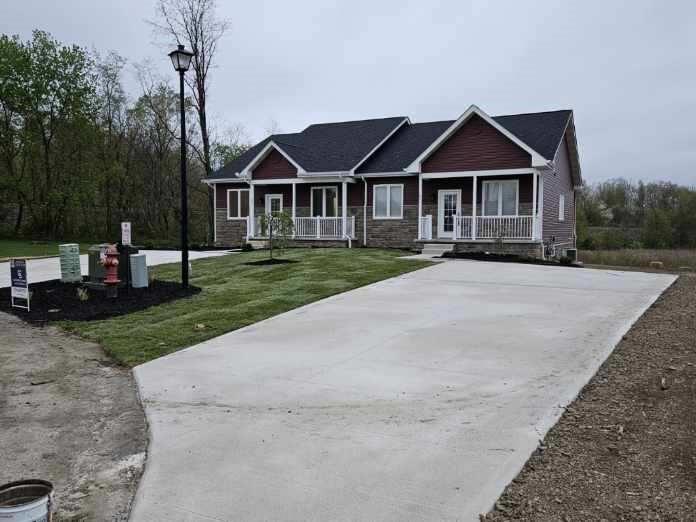 801 Wimbledon Drive Mount Pleasant, PA 15666 - Photo 2 of 18 a front view of a house with yard