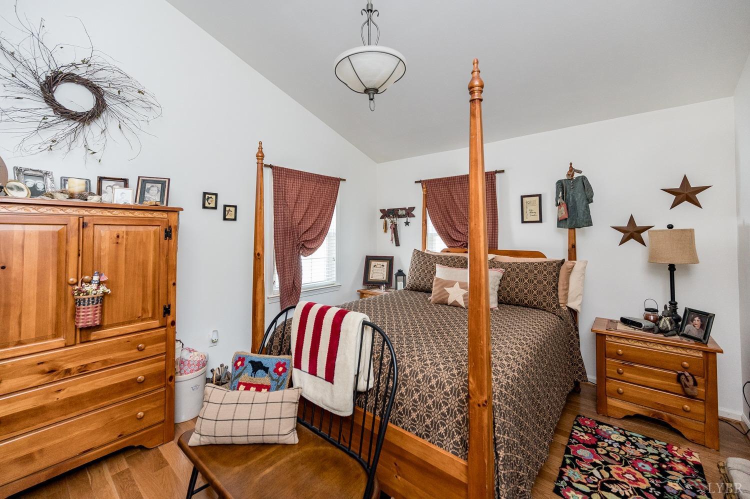 375 East Perch Road Monroe, VA 24574 - Photo 19 of 73 a bedroom with furniture and a bed