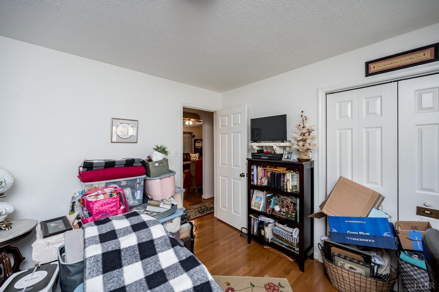375 East Perch Road Monroe, VA 24574 - Photo 23 of 73 a living room with furniture and a flat screen tv