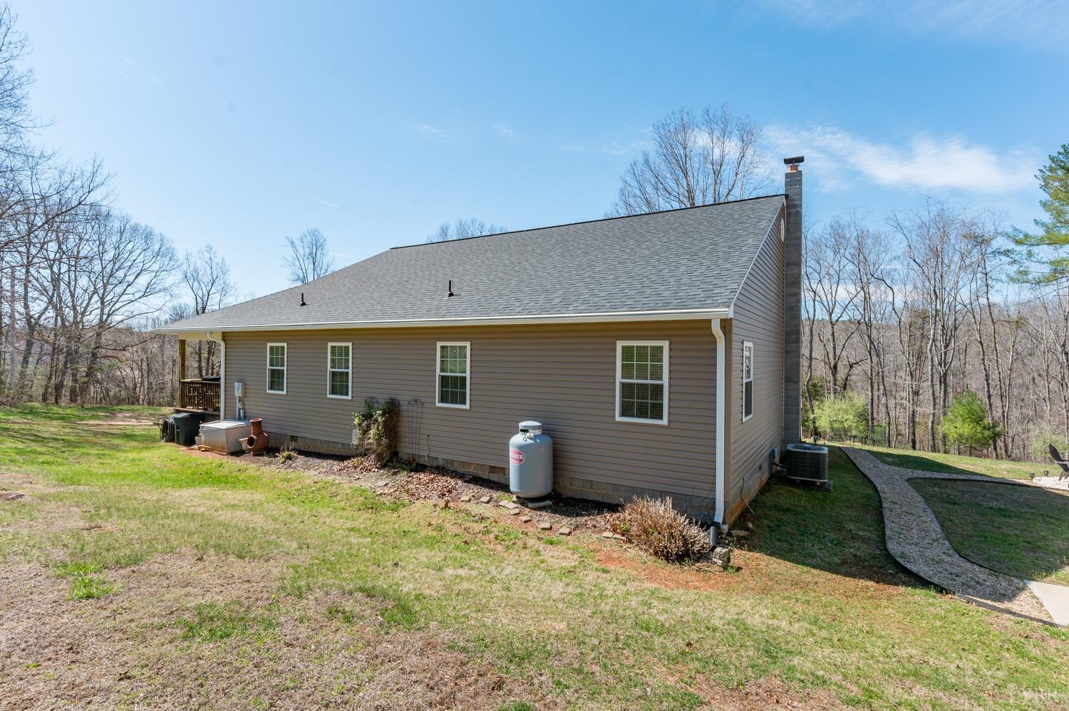 375 East Perch Road Monroe, VA 24574 - Photo 51 of 73 a view of a house with backyard and sitting area