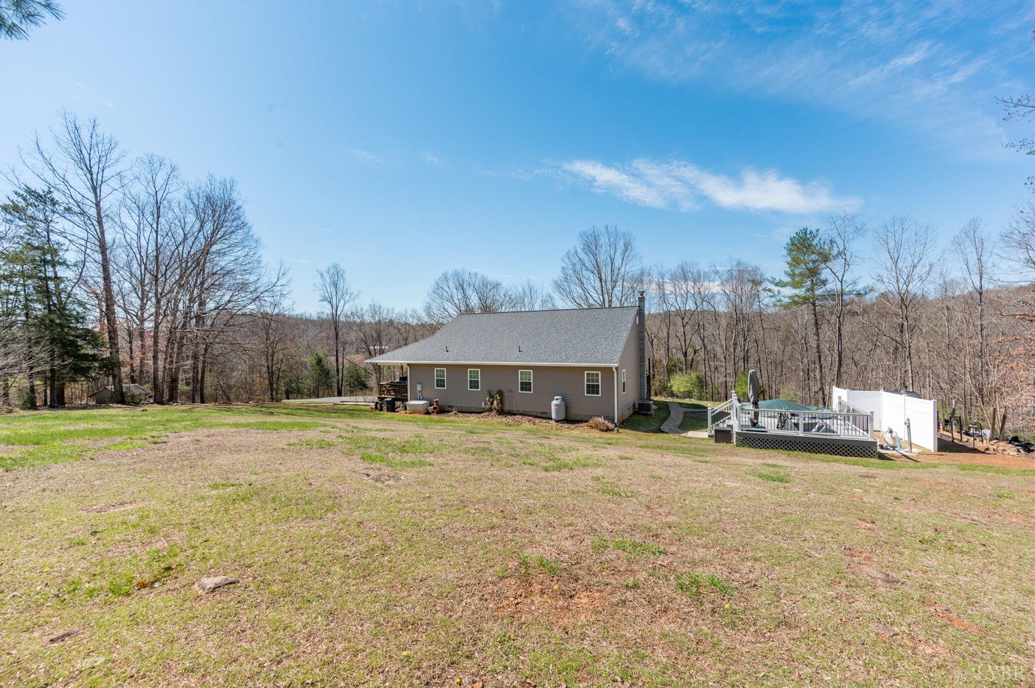 375 East Perch Road Monroe, VA 24574 - Photo 53 of 73 a view of a house with a yard and sitting area