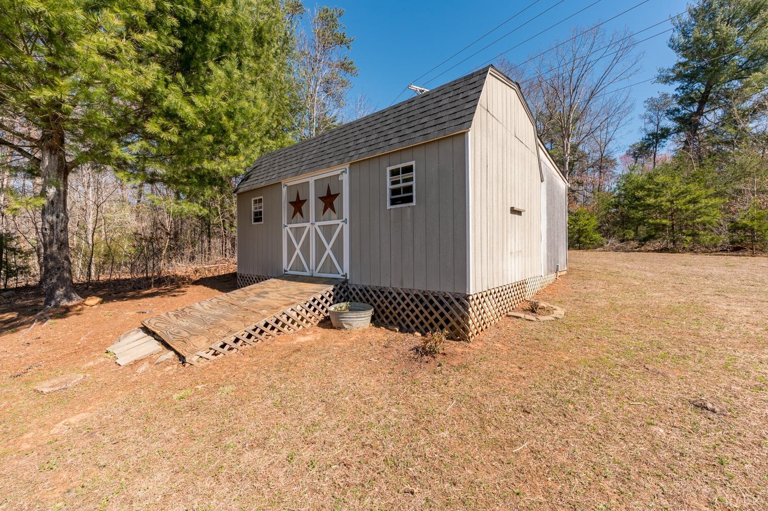 375 East Perch Road Monroe, VA 24574 - Photo 55 of 73 a view of a house with a yard covered in snow