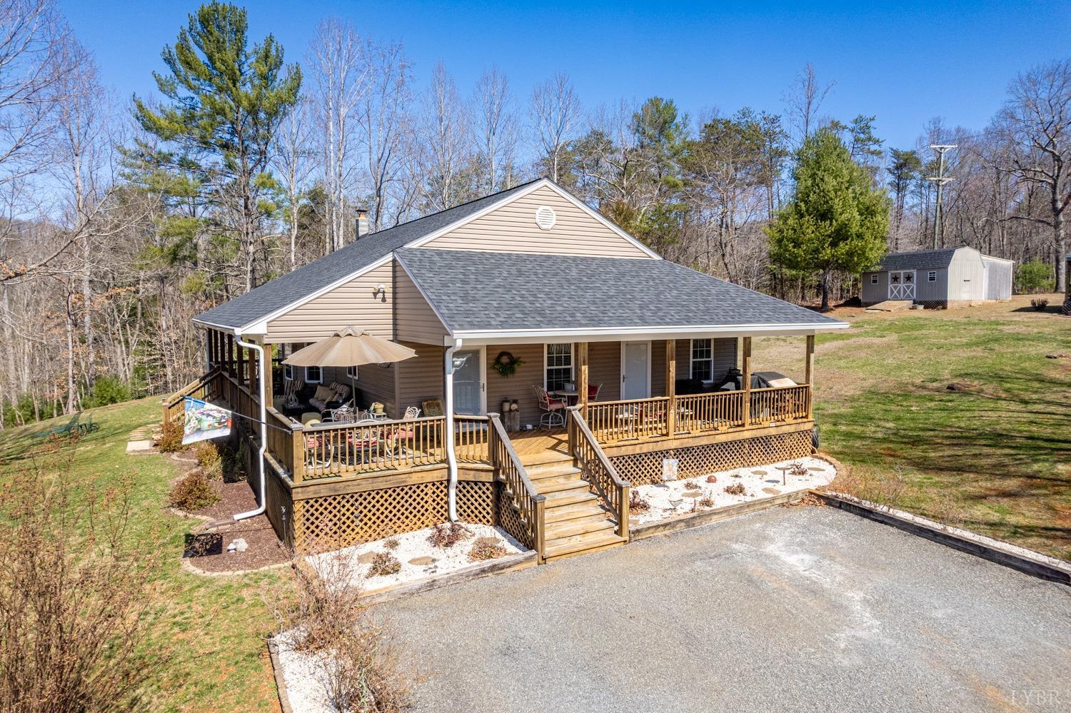 375 East Perch Road Monroe, VA 24574 - Photo 61 of 73 a view of a house with backyard porch and sitting area