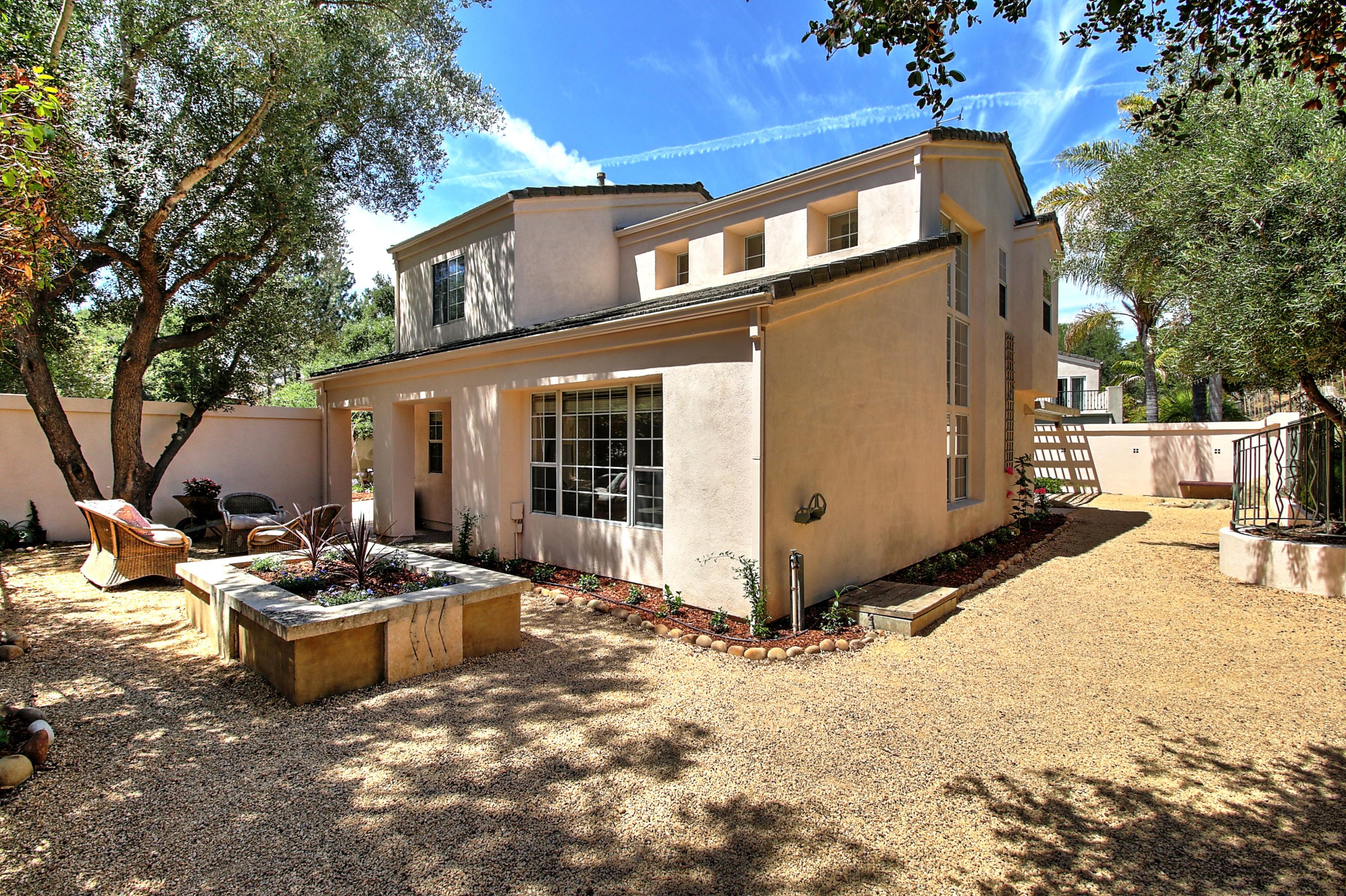 4008 Primavera Road Santa Barbara, CA 93110 - Photo 16 of 21 a view of a house with backyard and sitting area