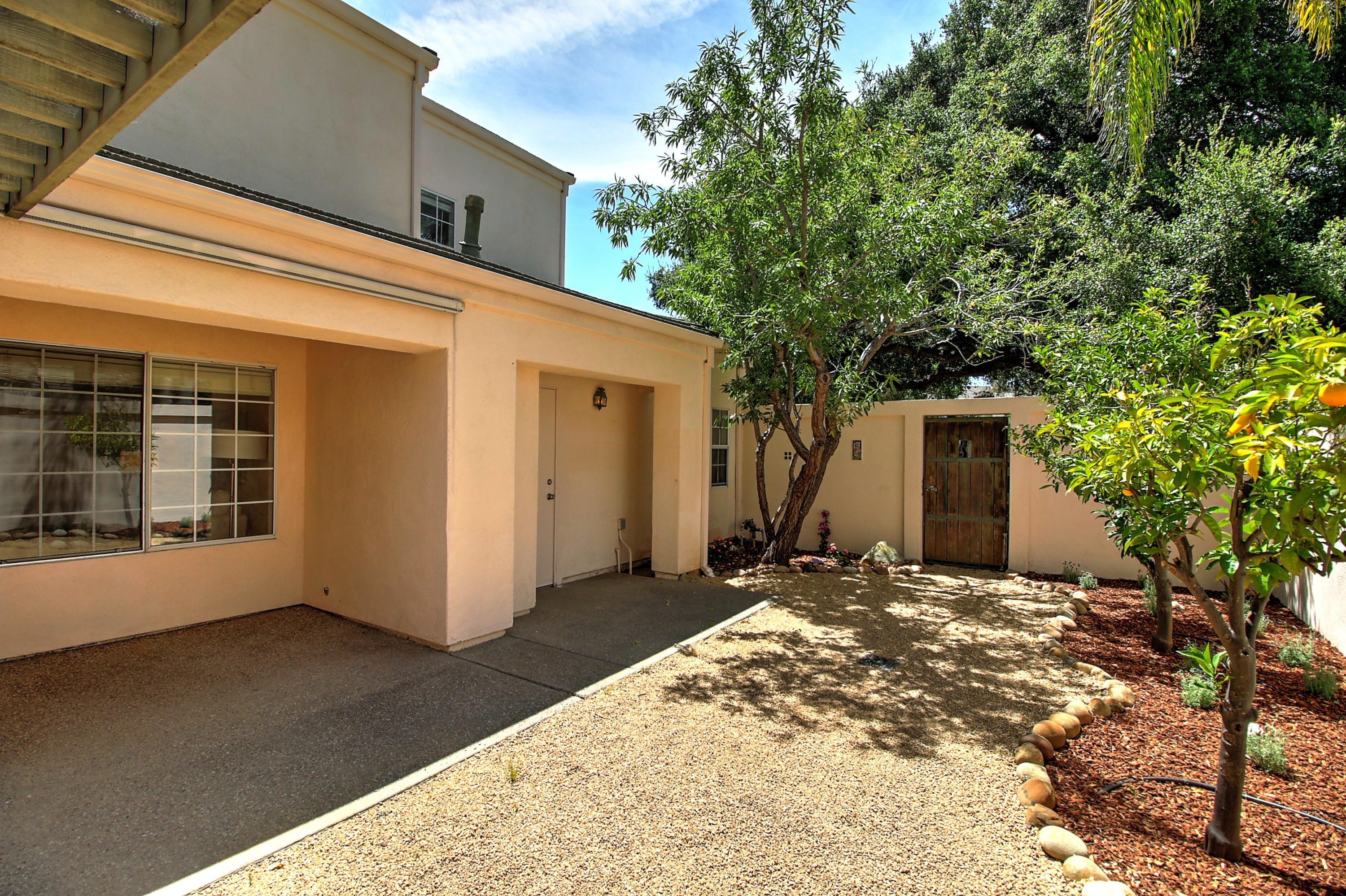 4008 Primavera Road Santa Barbara, CA 93110 - Photo 17 of 21 a view of a house with a backyard