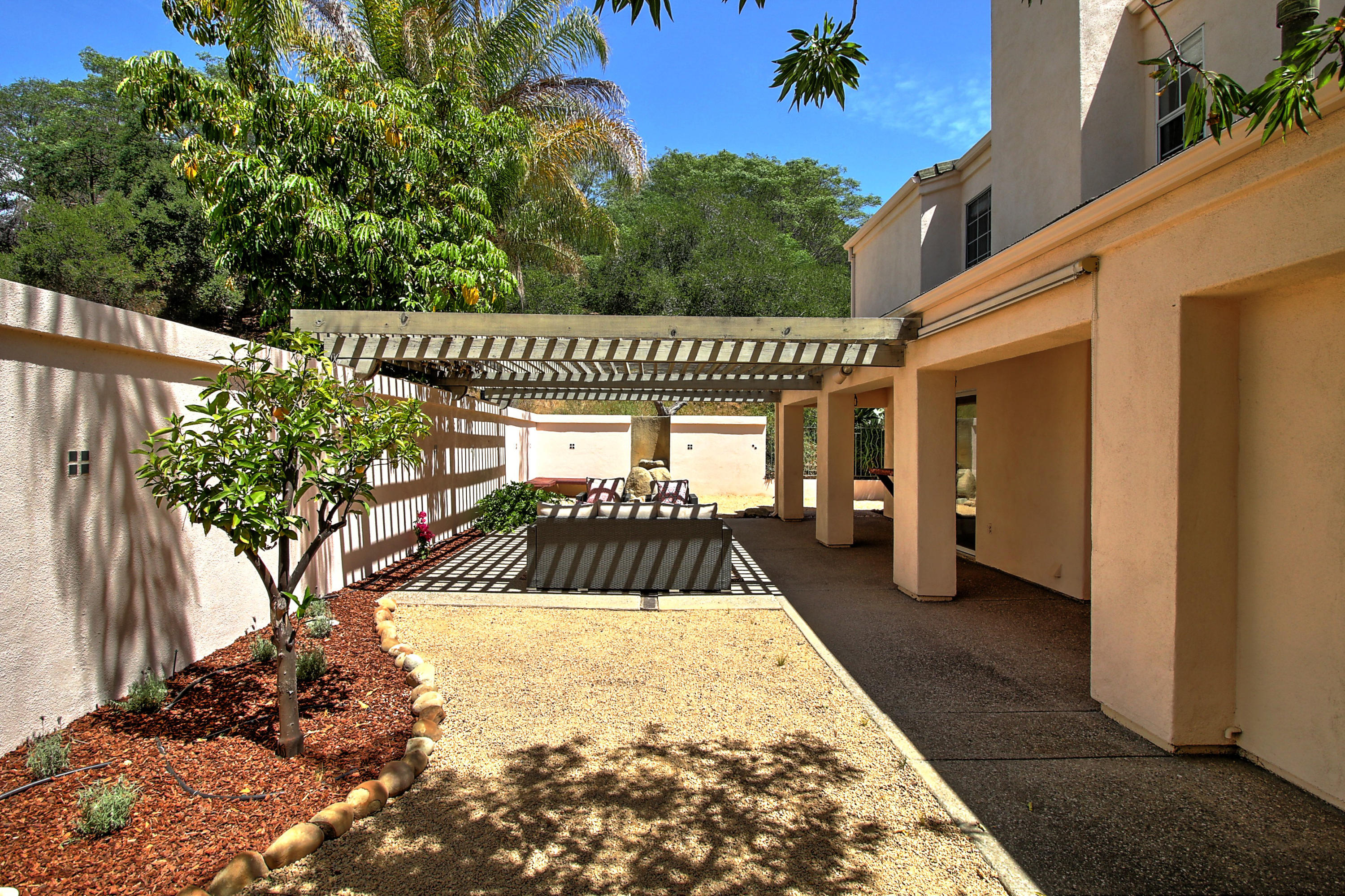 4008 Primavera Road Santa Barbara, CA 93110 - Photo 18 of 21 a view of a back yard of the house