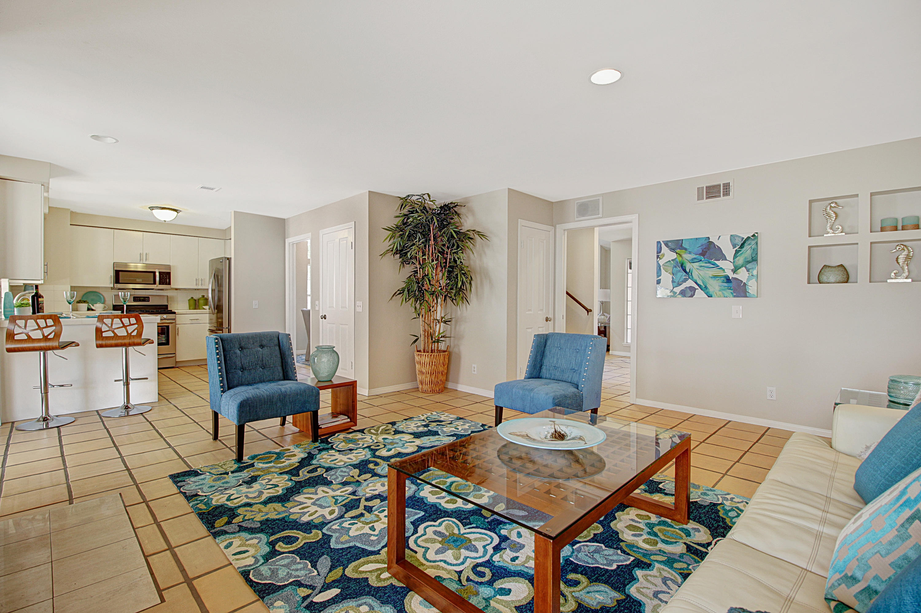 4008 Primavera Road Santa Barbara, CA 93110 - Photo 20 of 21 a living room with furniture and view of kitchen