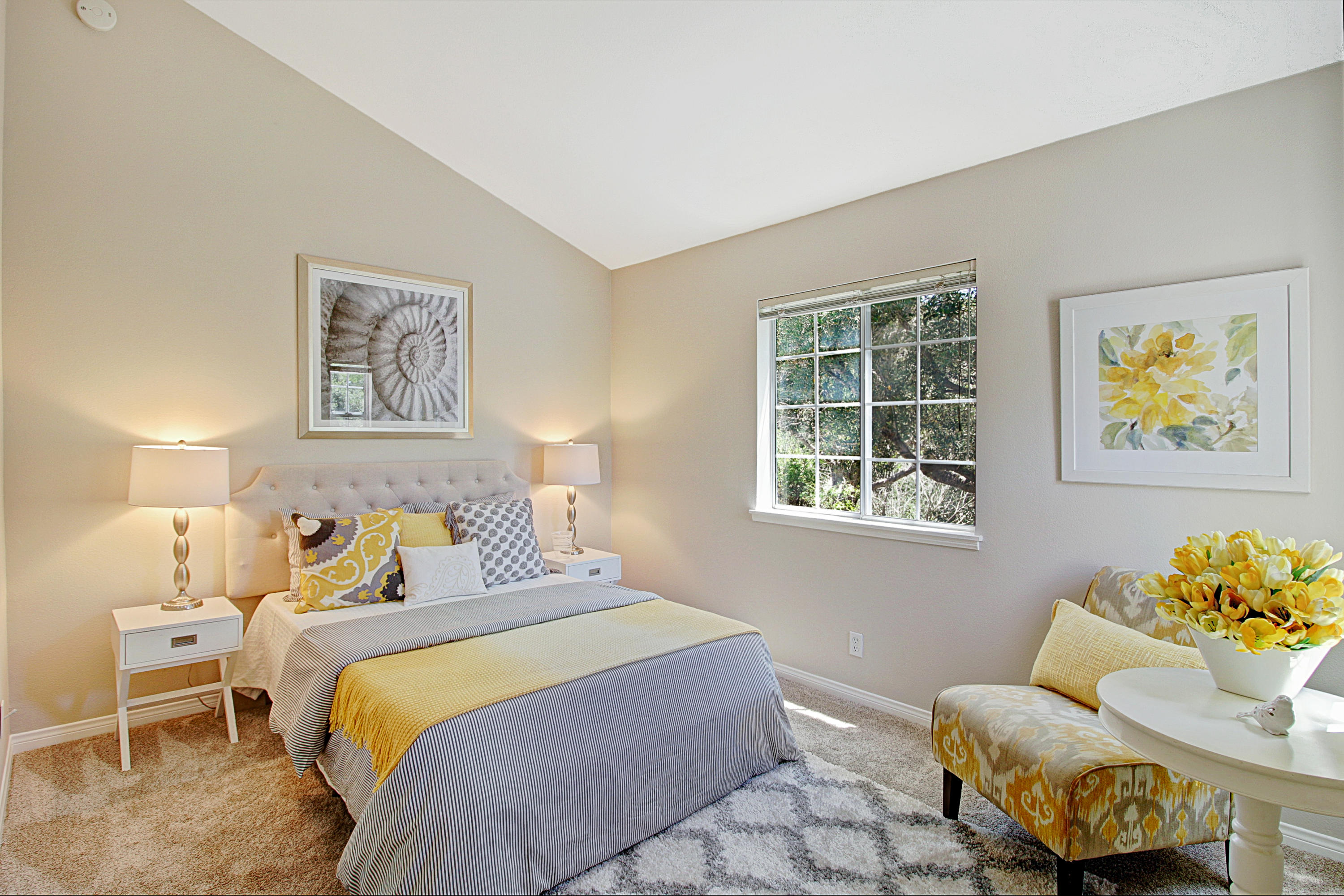 4008 Primavera Road Santa Barbara, CA 93110 - Photo 9 of 21 a bedroom with a bed and wooden floor