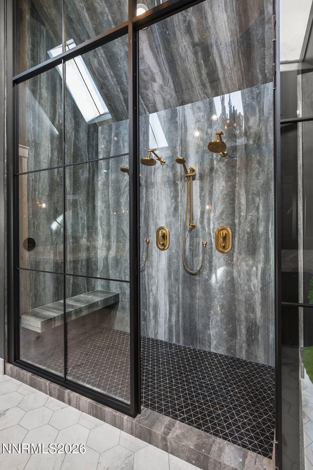 1426 Foothill Road Reno, NV 89511 - Photo 33 of 100 a bathroom with a glass shower door
