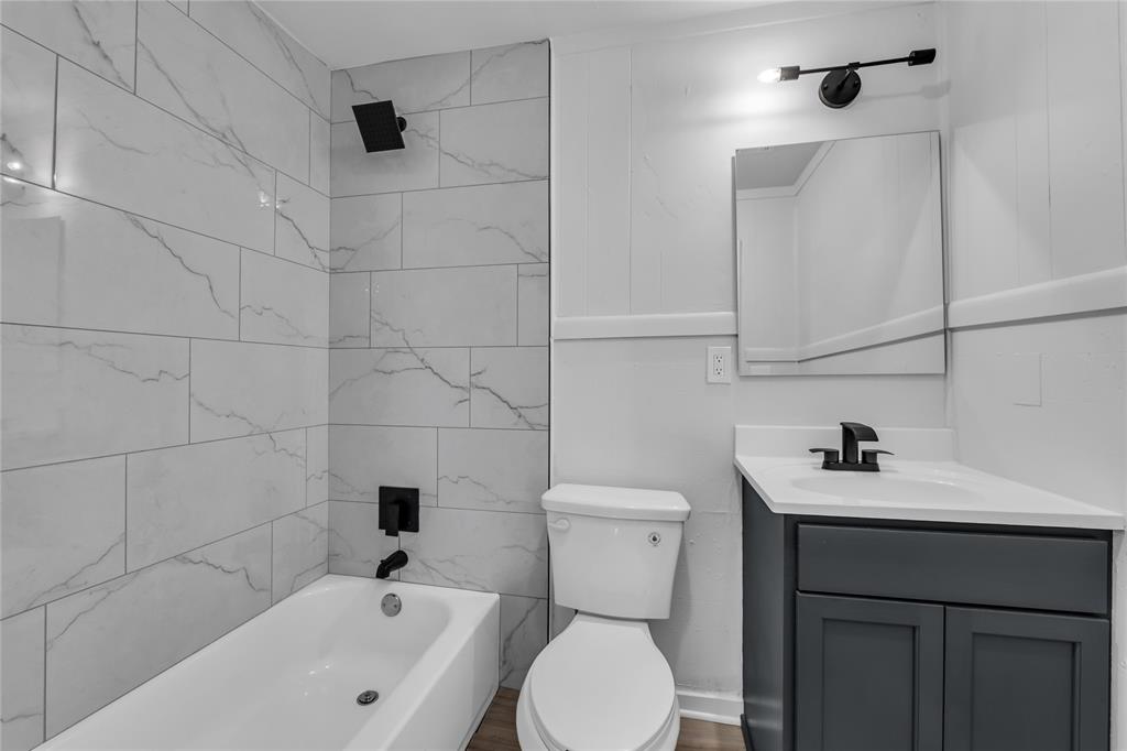 2524 McFerrin Avenue Waco, TX 76708 - Photo 15 of 29 a bathroom with a sink toilet and shower