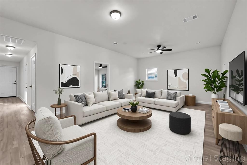 2524 McFerrin Avenue Waco, TX 76708 - Photo 6 of 29 a living room with furniture and a large mirror