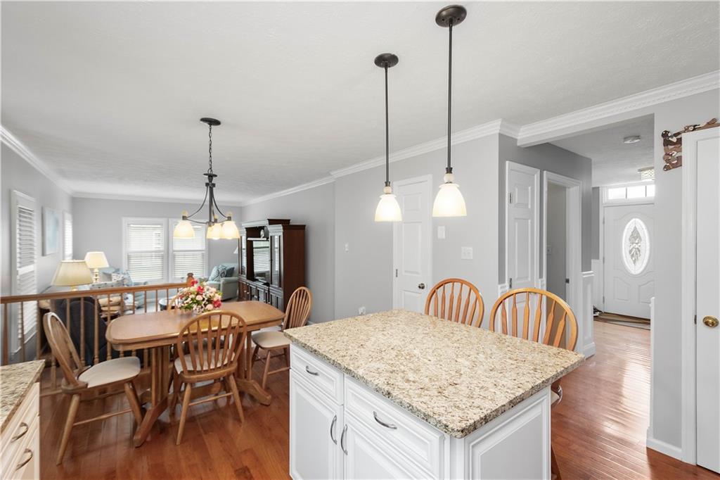 104 Camelot Circle Coraopolis, PA 15108 - Photo 12 of 33 a view of a dining room with furniture window and wooden floor