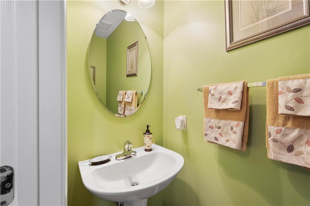 104 Camelot Circle Coraopolis, PA 15108 - Photo 18 of 33 a bathroom with a sink and mirror