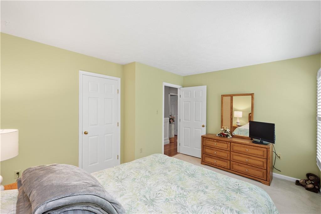 104 Camelot Circle Coraopolis, PA 15108 - Photo 25 of 33 a bedroom with a bed and television