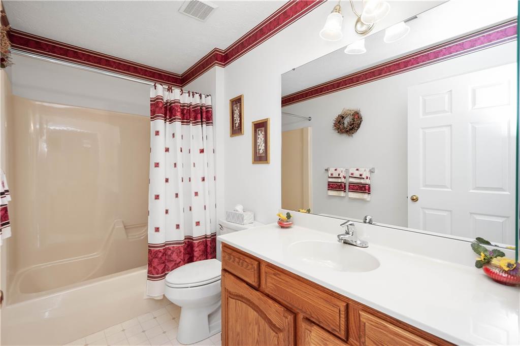104 Camelot Circle Coraopolis, PA 15108 - Photo 28 of 33 a bathroom with a sink toilet vanity and shower