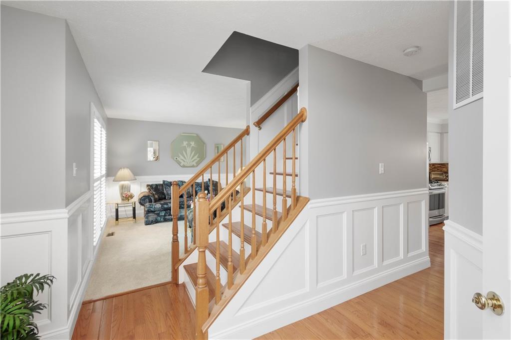 104 Camelot Circle Coraopolis, PA 15108 - Photo 4 of 33 a view of entryway and hall with wooden floor