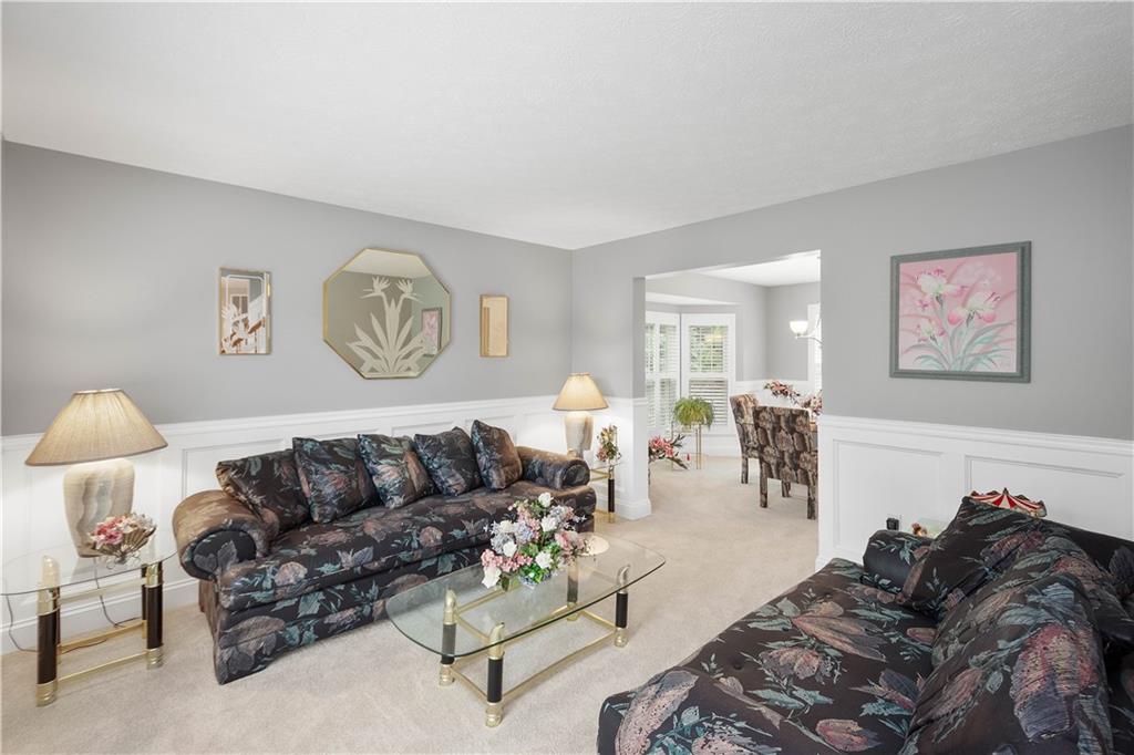 104 Camelot Circle Coraopolis, PA 15108 - Photo 5 of 33 a living room with furniture a couch and dresser