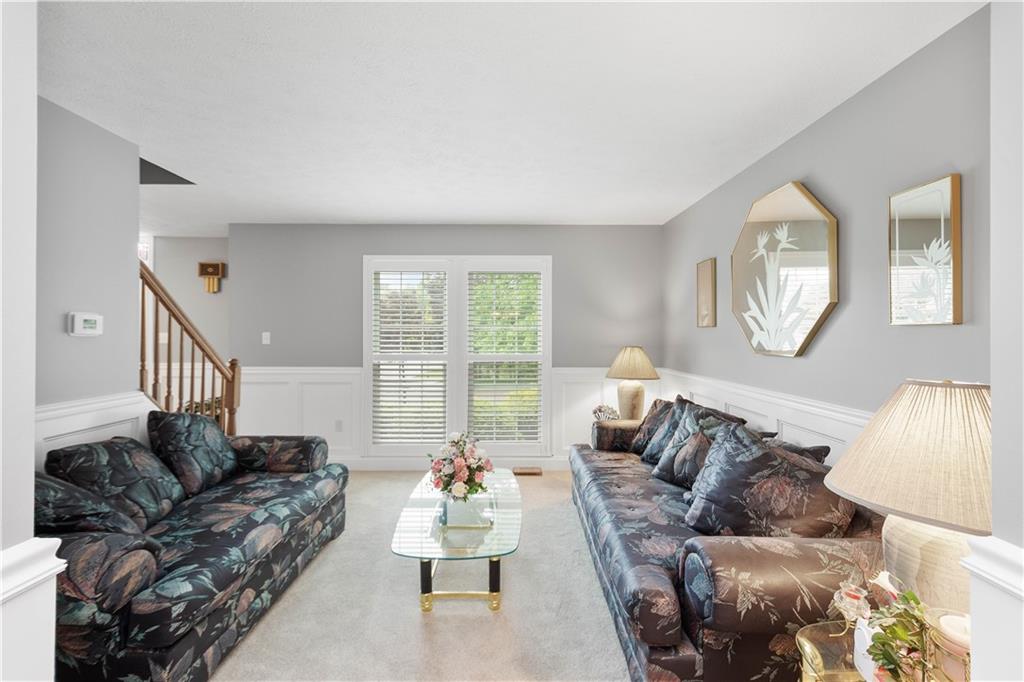 104 Camelot Circle Coraopolis, PA 15108 - Photo 6 of 33 a living room with furniture and a large window