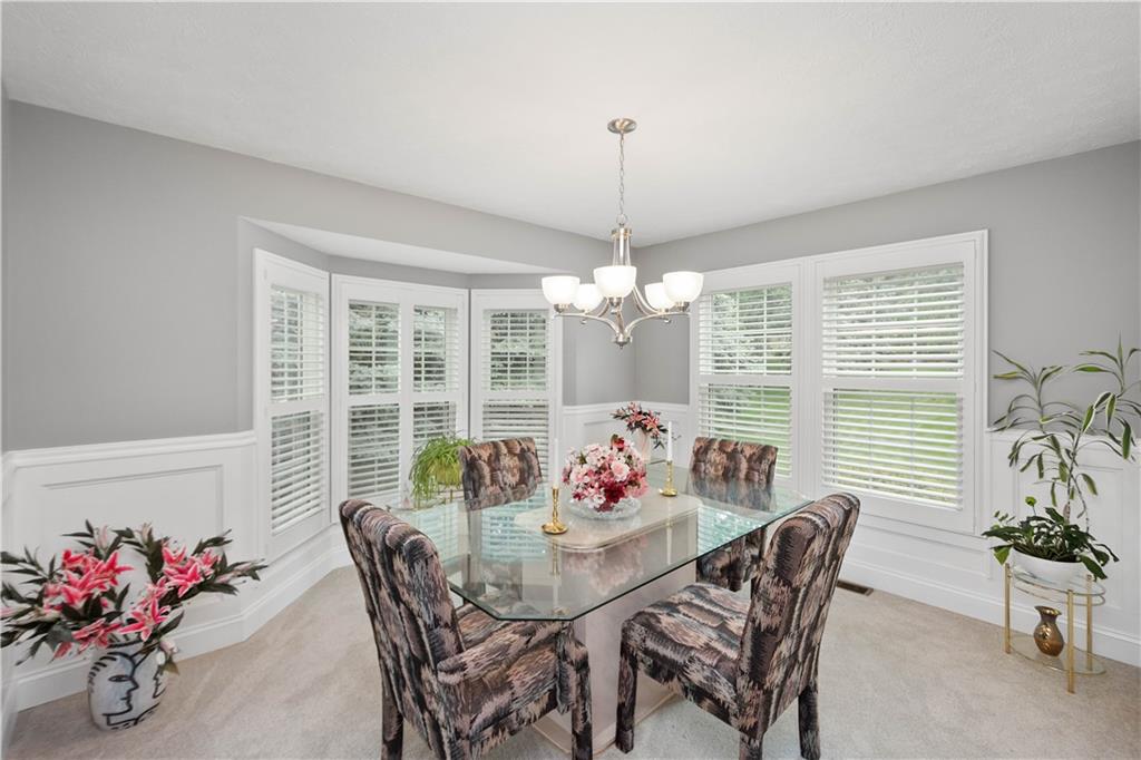 104 Camelot Circle Coraopolis, PA 15108 - Photo 7 of 33 a view of a dining room with furniture window and outside view