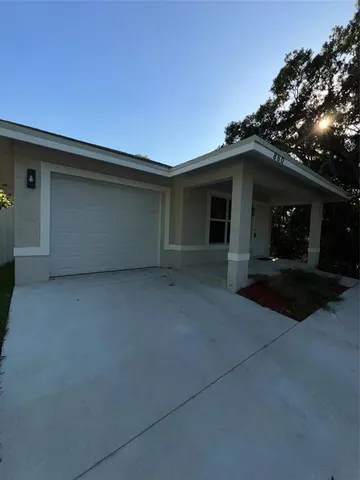 front view of a house with yard