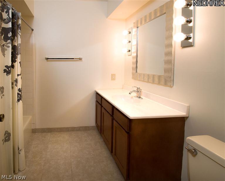2610 Addyston Road Akron, OH 44313 - Photo 15 of 20 Guest Full Bath - features new vanity, new ceramic tile floor and fresh paint.