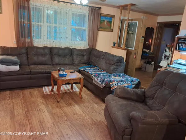 a living room with furniture and a couch