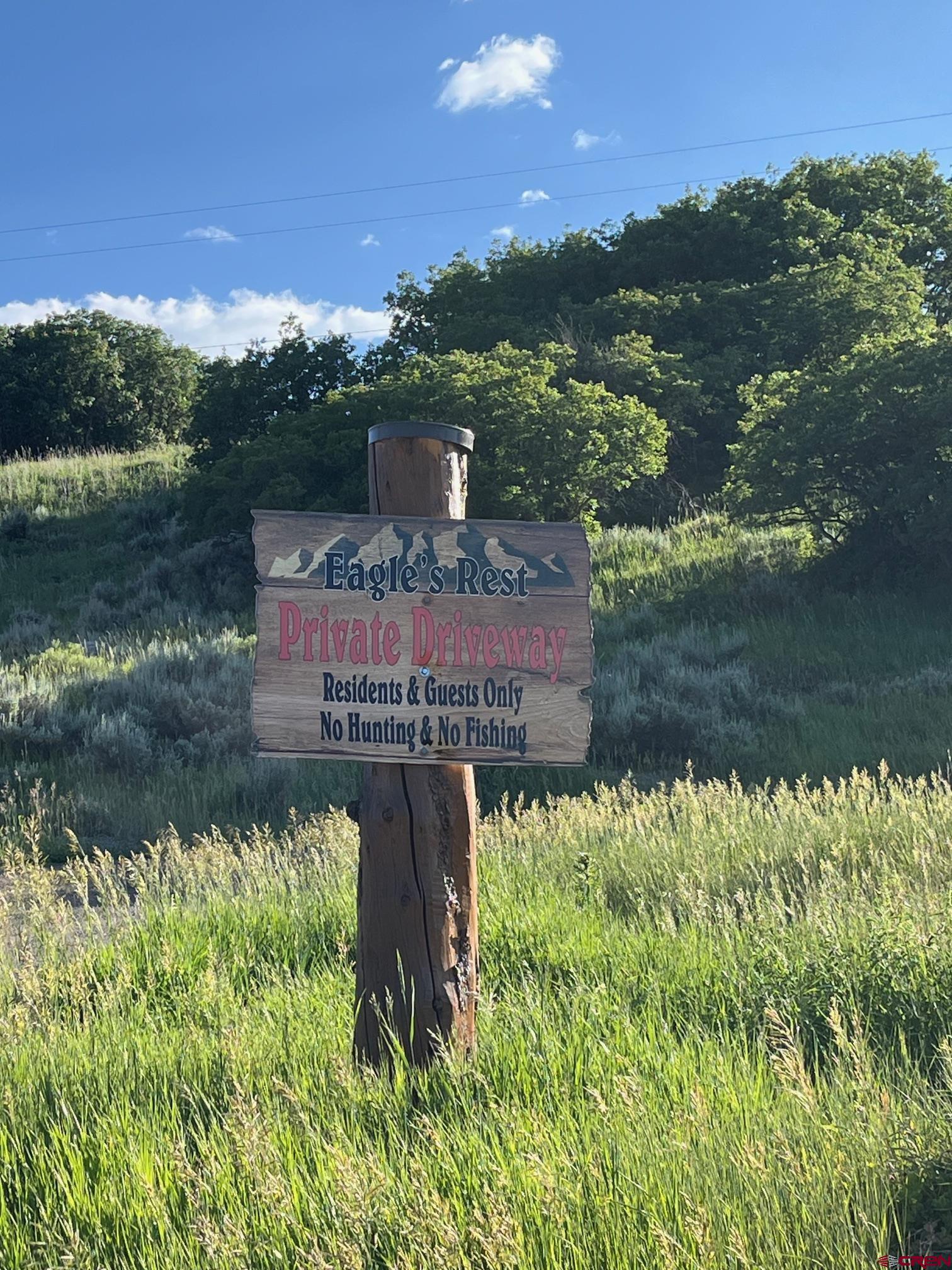 Tbd Eagles Rest Montrose, CO 81220 - Photo 7 of 8 a view of a lake with a mountain in the background