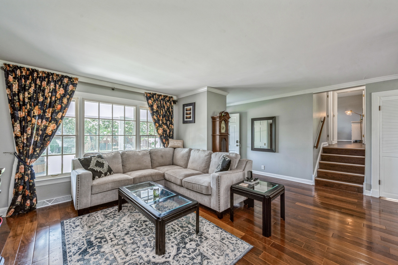 426 High Road Cary, IL 60013 - Photo 5 of 28 a living room with furniture and a large window