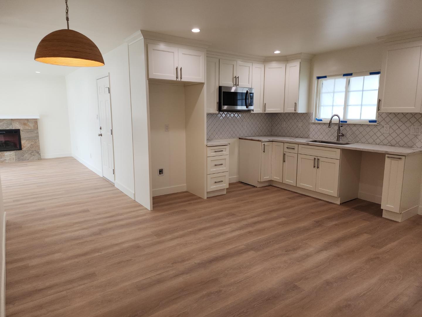 3280 Cheyenne Drive Merced, CA 95348 - Photo 12 of 34 a kitchen with stainless steel appliances a refrigerator sink and microwave