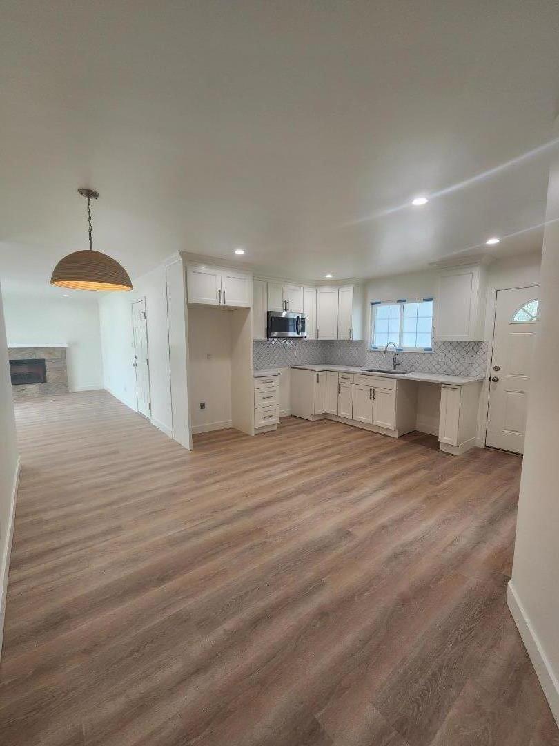 3280 Cheyenne Drive Merced, CA 95348 - Photo 15 of 34 a view of a kitchen with a sink and a stove